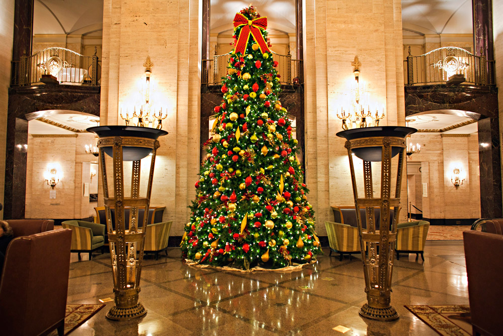 Large Christmas tree decorated in a hotel lobby